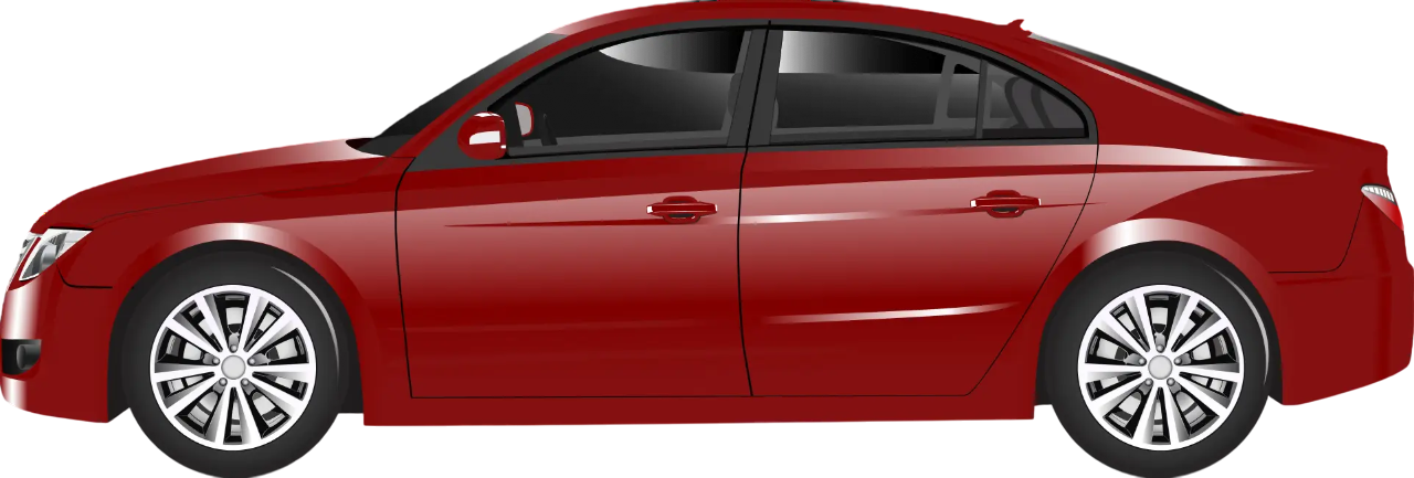 Side view of a red sedan with alloy wheels